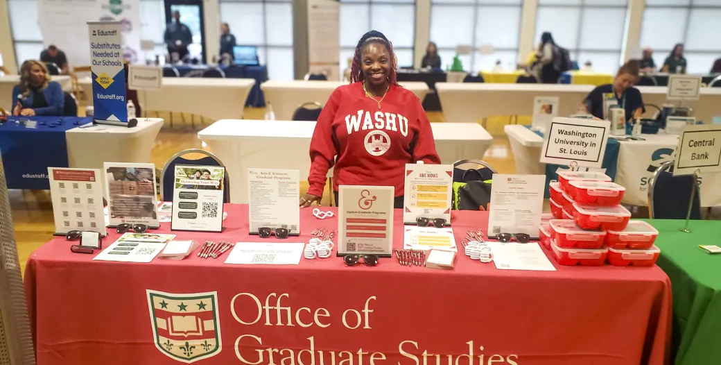 "WashU recruiter attending a conference"