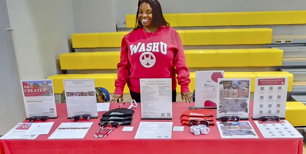 "WashU recruiter attending a conference event"