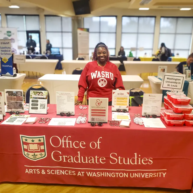 "WashU recruiter attending a conference"