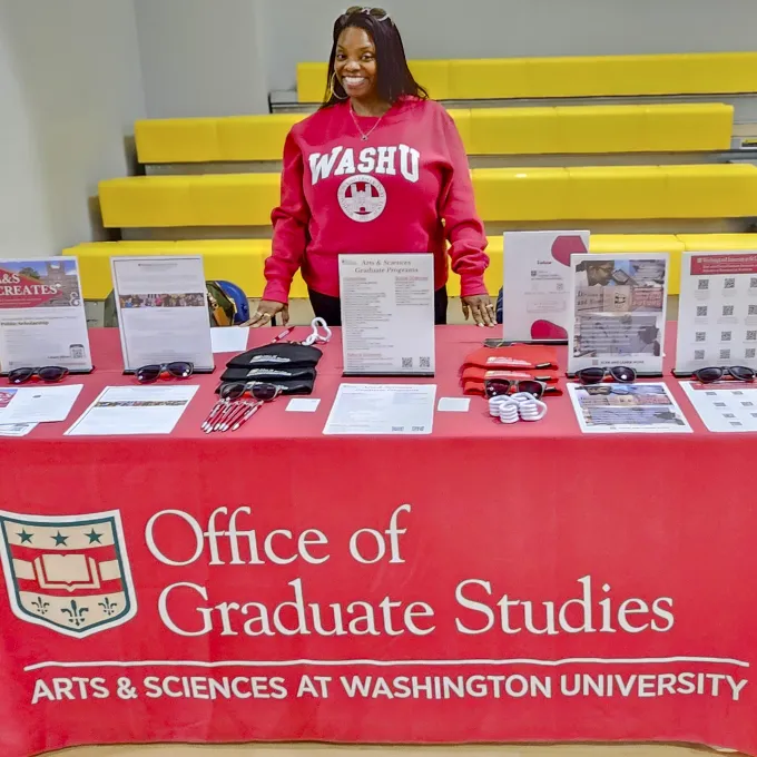 "WashU recruiter attending a conference event"