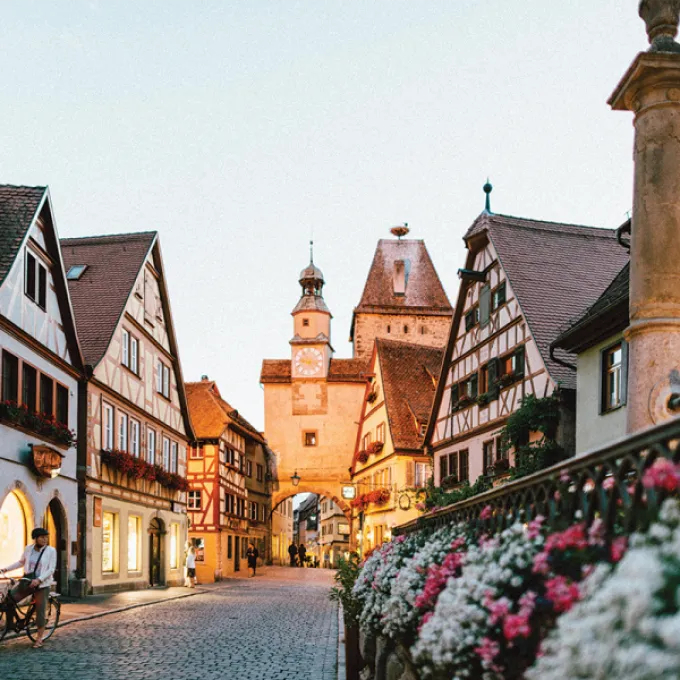 A cobblestone German street lined with houses